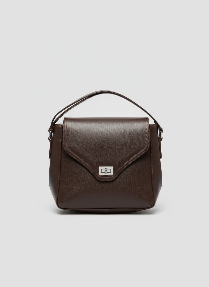 Brown handbag with a visible brand logo on a light gray background