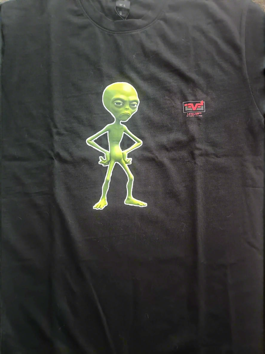 Black t-shirt with a green alien graphic and a logo on the chest.